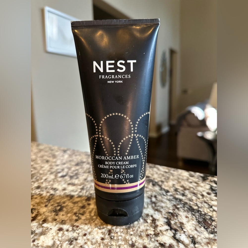 Nest Moroccan Amber hand lotion. About 80% full.